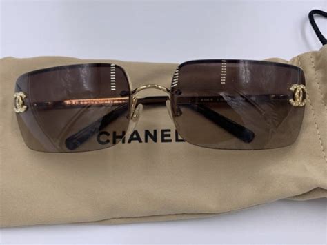 the chanel diamante sunglasses w/ rhinestones|chanel sunglasses pouch.